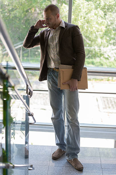 istock Businessman speaking on the phone 585301424