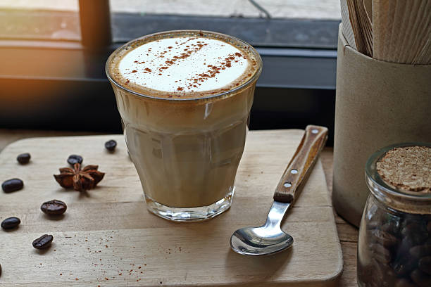 istock Coffee cup of cappuccino and cookie 585301596