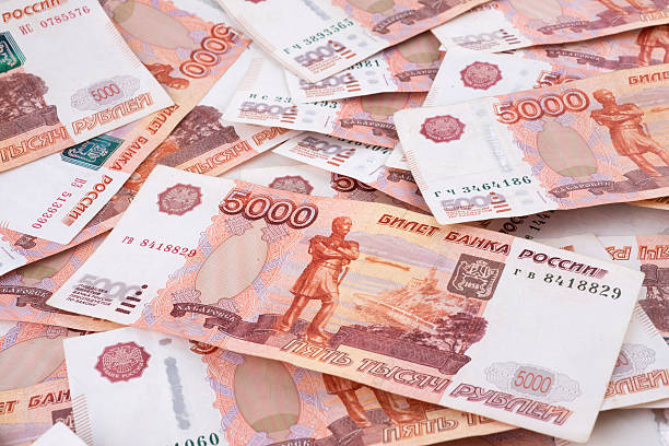 istock Heap of five thousand russian rubles banknotes 585301788