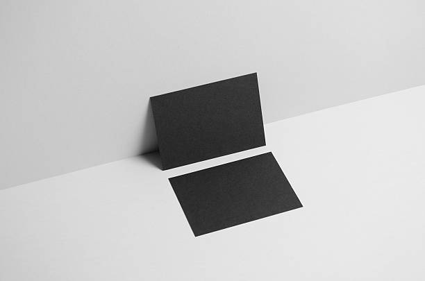 istock Black A6 Flyer / Postcard Mock-Up - Wall Background 585302330