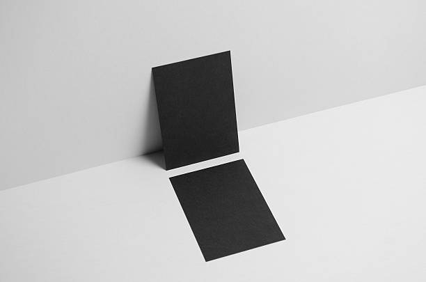 istock Black A6 Flyer / Postcard Mock-Up - Wall Background 585302410