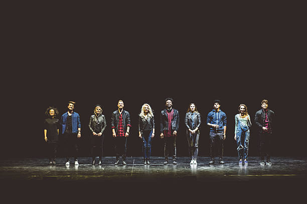 istock Group of young actors on the stage 585302588