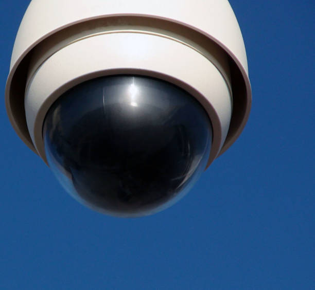 istock Scene Of Blue Sky Including CCTV Road Security Camera 585302936