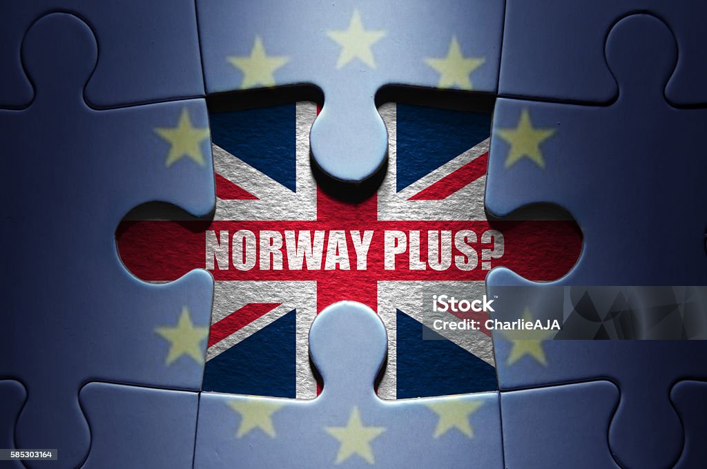 Brexit negotiations jigsaw puzzle concept Missing piece from a European jigsaw puzzle revealing the British flag and norway plus question Brexit Stock Photo