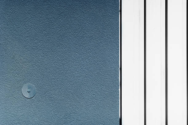 istock Fragment of a wall painted with stripes 585303336