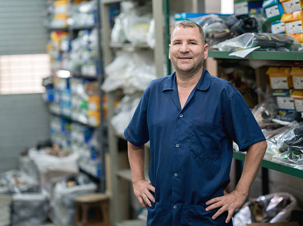 istock Happy worker working at a factory 585304762