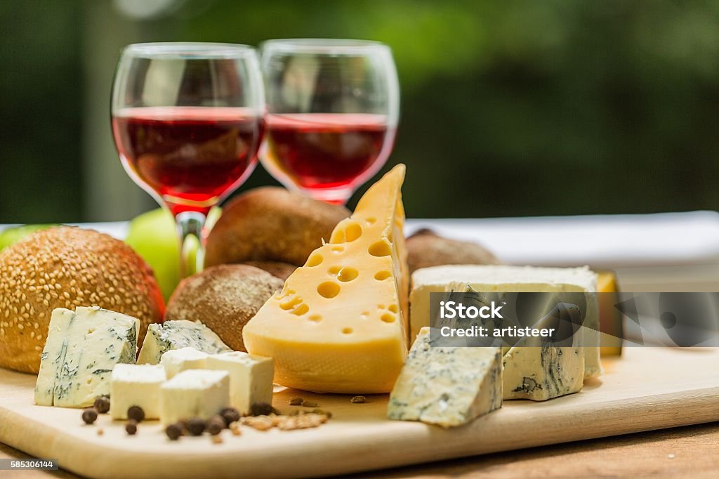 Wine Glasses of Wine with Cheese and Bread Cheese Stock Photo