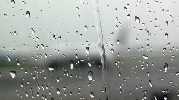 istock Scenery Of Water Drops On Glass 585306228