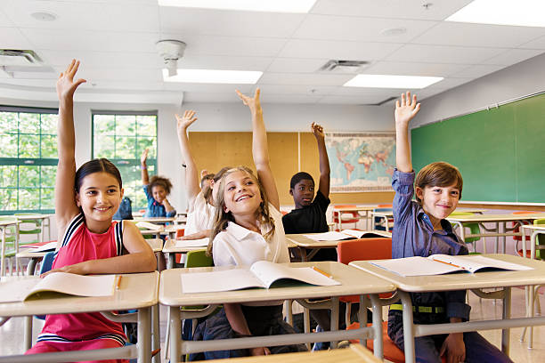 istock School kids in classroom 585306400