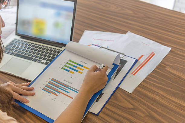 istock Reading reports is daily work manager must do in morning 585307364