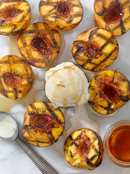 Grilled Peaches with Vanilla Ice Cream and Maple Syrup