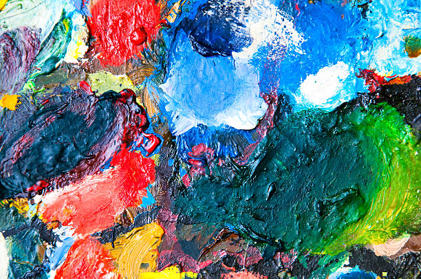 istock Oil paints multicolored closeup abstract background 585309482