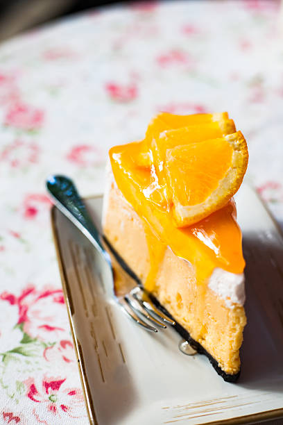 istock Slices of orange over cake. 585310628