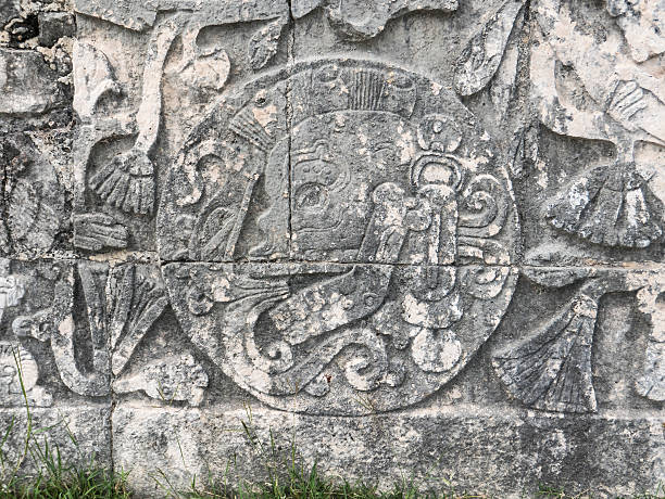 istock skulls sculpture detail in chichen itza mexico 585311858