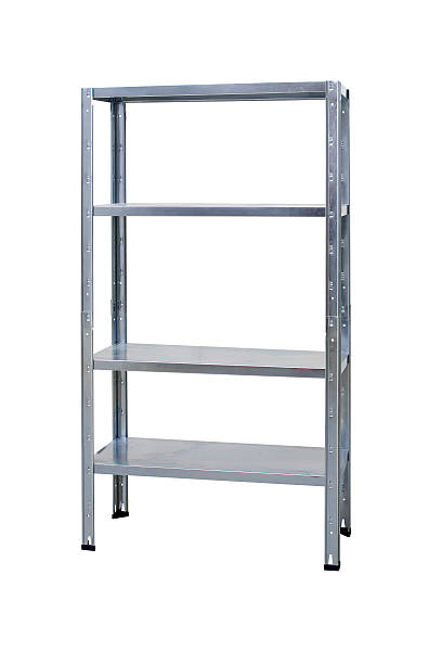 istock Empty metal storage shelf or rack isolated on white 585312460