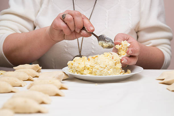 Filling dumplings stuffed with cheese and potatoes.