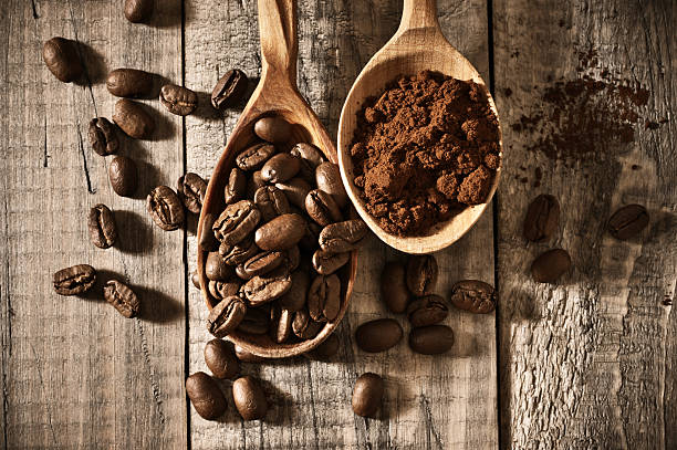 istock Coffee beans and ground close-up 585315394