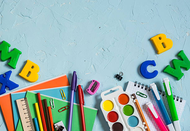 istock School supplies and accessories on a blue background. 585316684