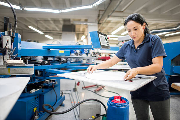 istock Worker ironing at a clothing factory 585317130