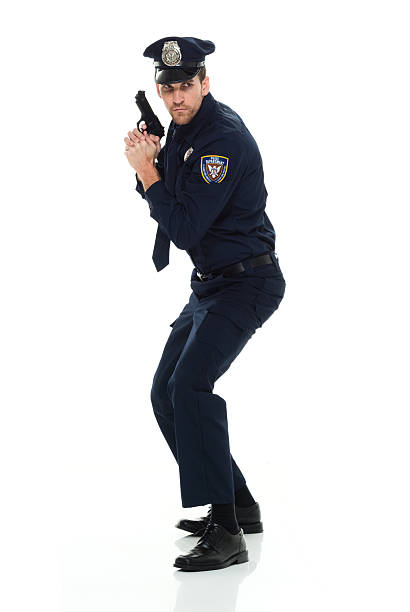 istock Police in action with handgun 585318270