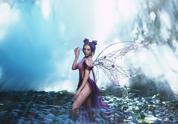 istock Beautiful fairy walking in the mist 585318326