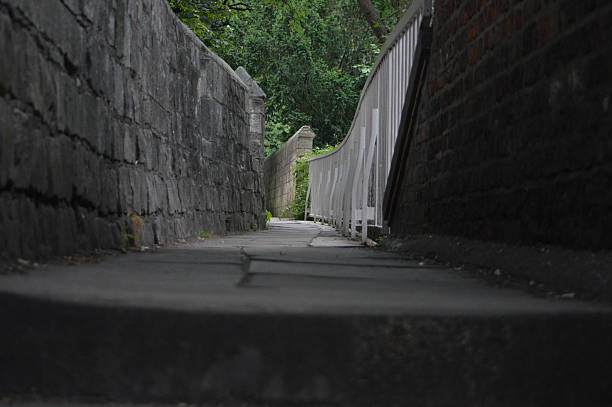 York city walls in the evening Photograph of York city walls early on a summer evening, looking North from Bootham Bar. madieval stock pictures, royalty-free photos & images