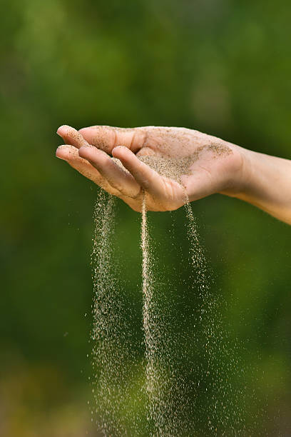 istock time is running like the sand through your fingers 585319212