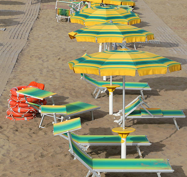 istock umbrellas in sandy beach seen from above in summer 585319290