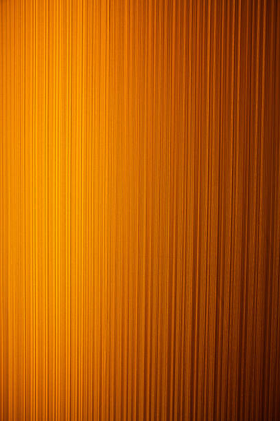 istock orange stripes striped wallpaper patten parallel lines luxury textile wall 585319360