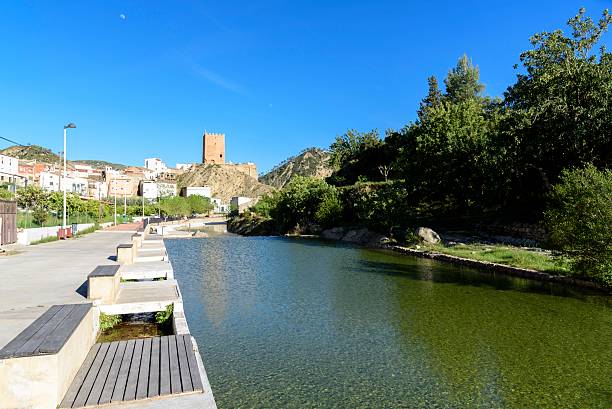 istock Spanish village beside a river 585321000
