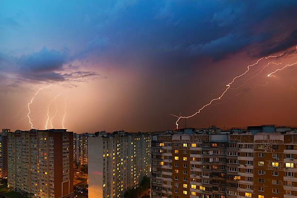 istock Storm clouds, heavy rain. Thunderstorm and lightning over the city. 585321136