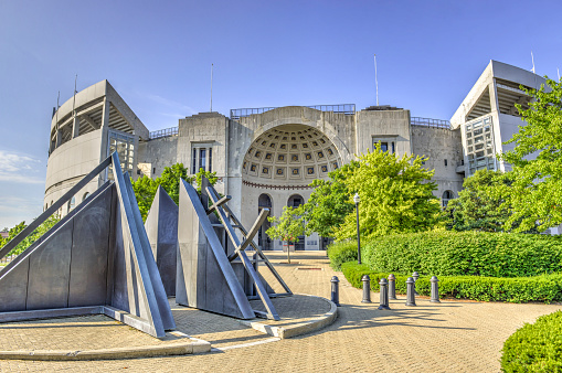 Columbus, Ohio, USA - July 31, 2016: Photograph of Ohio Stadium on the campus of The Ohio State University in Columbus, Ohio. This stadium is home of the Ohio State Buckeyes football team. It was taken in the morning with the sun facing the front of the stadium.