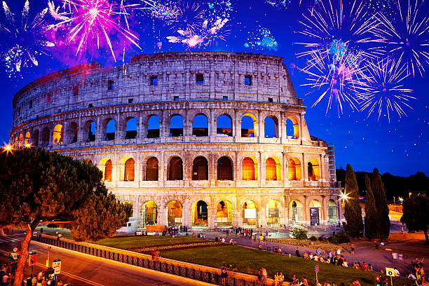 istock Fireworks over the Colosseum at Night in Rome, Italy 585321406