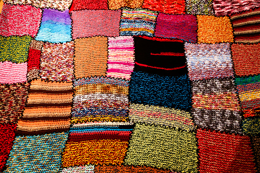Bright multi-coloured handmade patchwork blanket
