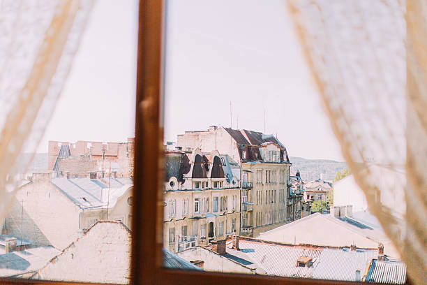 istock Lviv old city panorama view at sunset, window with great 585325298