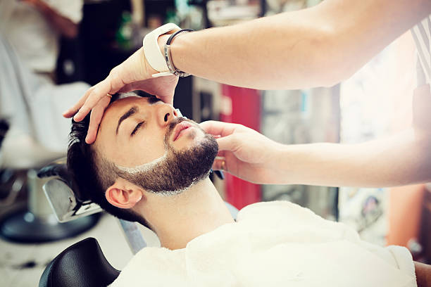 istock Traditional ritual of shaving the beard 585327260