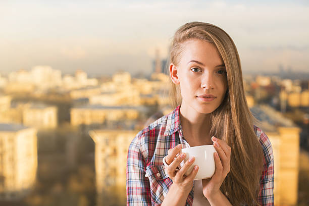 istock Thoughtful woman drinking coffee 585328414