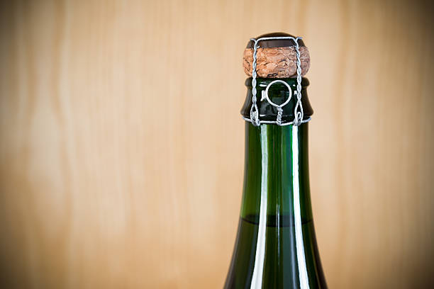 istock bottle of unopened sparkling wine close up 585482010