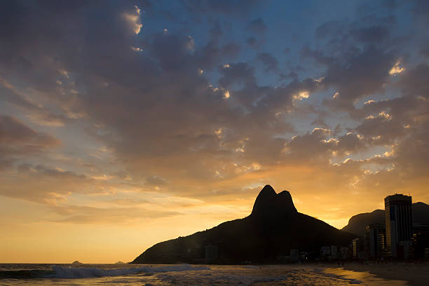 Sunset at Ipanema Beach, Rio de Janeiro, Brazil, overlooking Morro Dois Irmãos.