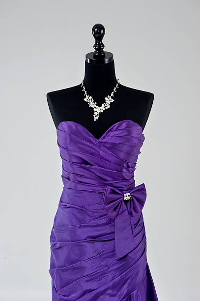 istock Modern purple wedding dress isolated on Grey background 585484852