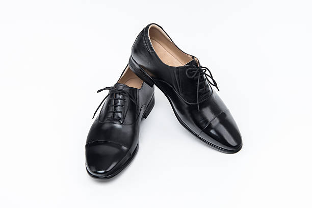 istock Black shoes isolated on white 585484934