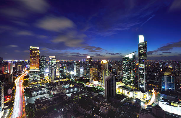 istock Shanghai skyscrapers cityscape at night 585486658