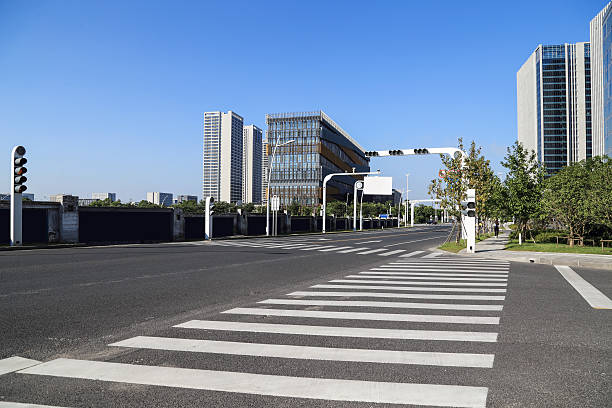 istock modern city road and building 585488438