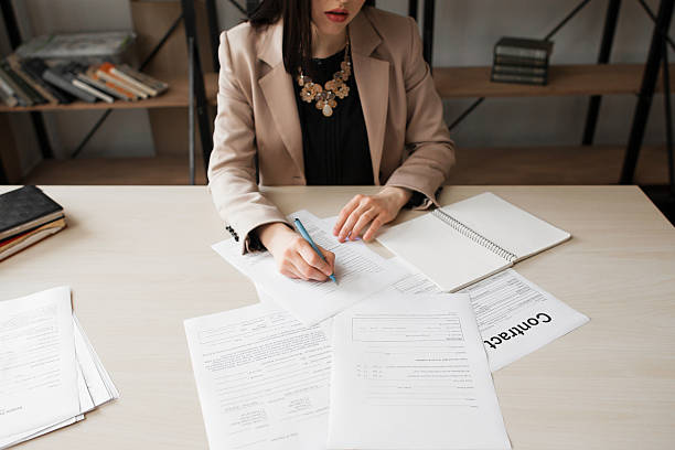 Business woman signing contract, success