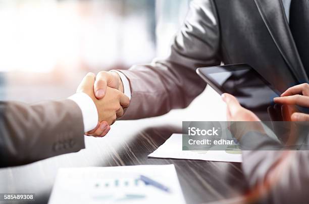 Business Partners Shaking Hands Stock Photo - Download Image Now - Adult, Agreement, Business