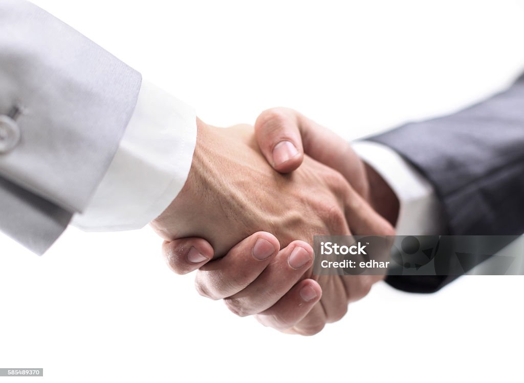 Business partners shaking hands Handshake isolated on white  background Adult Stock Photo