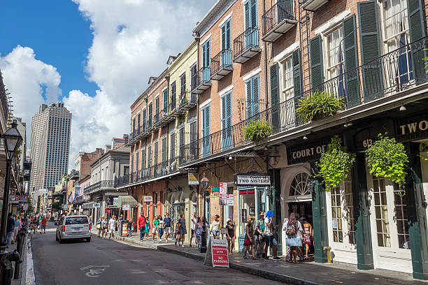 The French Quarter in New Orleans NEW ORLEANS - AUGUST 25: People traveling in The French Quarter in New Orleans on August 23, 2015 french quarter stock pictures, royalty-free photos & images