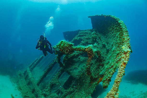 istock Wreck diving over a shipwreck Scuba diver point of view 585491940