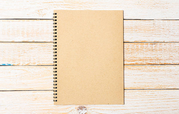 Diary notebook on white wooden background, Business template mock up stock photo