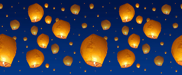 istock background with paper lanterns in night sky 585492954